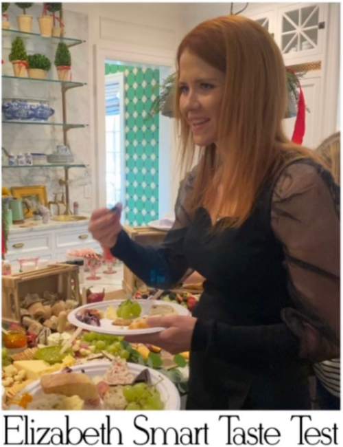 Elizabeth-smart-La-Belle-Vie-Charcuterie-UTAH-Catering-Grazing-Tables-labelleviecharcuterie-•-Instagram-photos-and-videos-02-07-2025_06_24_AM Social media post showing Elizabeth Smart at an event with a La Belle Vie Charcuterie display in the background. Questions arise as to it's authenticity.