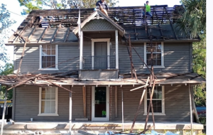 The exterior of Mr. Bridget's home just before the alleged abandonment by North Woods Roofing.