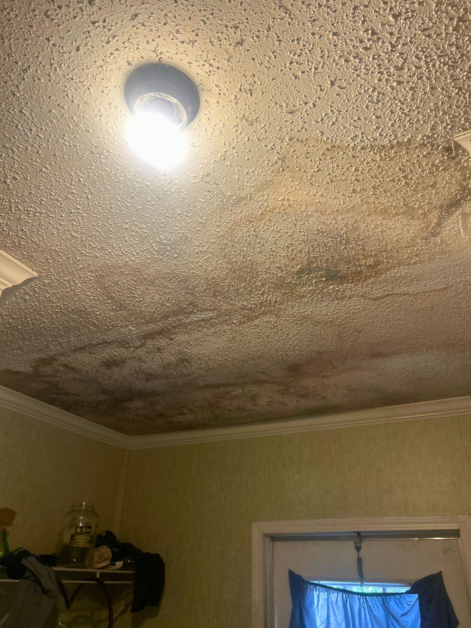 Water damaged rooms that Spectrum Roofing and Renovations contracted for but did not finish.